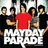 Group of six people standing together with one person in red shirt at center, text "MAYDAY PARADE" in white and "mayday parade" in blue.