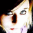 Pixelated close-up of a stylized face with wide eyes, open mouth showing teeth, and red lips against dark background.