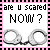 Pixelated text and handcuffs on a pink and black checkered border, with text changing from black to pink.