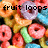 Pixelated image of colorful cereal loops with overlaid text reading 'fruit loops are gay churios!' in black block letters.
