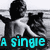 A black-and-white animated sequence shows a figure with outstretched arms, transitioning through text overlays and color changes.