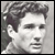 Static grayscale pixelated image of a person's face with visible hair and facial features, rendered in low resolution with dithering effects.