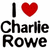 Six pixelated heart icons in red, orange, yellow, green, blue, and purple above two lines of text reading Charlie and Rowe in black font.