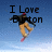Pixelated image with blue gradient background showing a figure in mid-air pose, text "I Love Boston" above the figure.