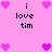 Pixelated pink background with scattered heart icons and repeated text "i love tim" in black pixel font.