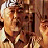 A 4-frame contact sheet of a pixelated animated icon featuring text and a character from The Karate Kid movie, arranged in a 2x2 grid with visible animation frames showing slight motion differences.