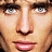 Pixelated close-up of a human face showing eyes, nose, and mouth with visible teeth in a neutral expression.