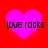 Four identical pink hearts on red background with 'love rocks' text, each heart slightly pixelated and varying in brightness.
