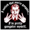 Pixelated image of a person with red hair and a red tie, making a gesture with both hands near the face, surrounded by text on a black background.