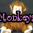 Pixelated image of a monkey with light brown fur, white face and hands, wearing pink text reading 'Monkey's' over its chest against dark background.