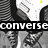 Pixelated grayscale image of two figures in Converse sneakers with text overlays reading 'converse' and 'love!!'