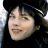A 48x48 pixel buddy icon featuring a split composition with a person on the left and bold text on a red background on the right.