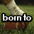 A pixelated image of a person's lower legs and feet on grass, with text overlays reading 'born to' and 'play'.