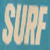 A split-frame contact sheet showing a static text panel on the left and an animated beach scene with a child holding a surfboard on the right, both in low-resolution pixel art style.