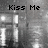 Black-and-white pixelated image with text reading "Kiss Me In The Rain" over a blurred background of vertical light and dark shapes.