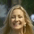 Animated contact sheet showing two sequential frames of a woman with long blonde hair smiling, displayed side-by-side in a 2x1 grid on a gray background.