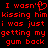 Red pixelated text on black background reads 'I wasn't kissing him i was just getting my gum back' with a heart symbol replacing the apostrophe in wasn't.