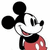 Pixelated cartoon character with large black ears, white face, black nose, red shorts with white buttons, and a black shirt, smiling against a white background.