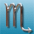 Two identical metallic Scorpio symbols with curved tails and white highlights on a blue gradient background.