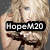 A pixelated image of a person with long blonde hair, wearing a dark top, with overlaid text labels in different positions.