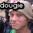 Pixelated static image shows a person with light brown hair wearing a white cowboy hat and green shirt, overlaid with black text reading 'dougie' in lowercase letters.