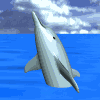 A dolphin leaps from blue water against a cloudy sky, its body angled upward with tail fin visible.