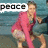 A person in a pink top and light shorts crouches on steps with water behind them, text overlays change from peace to hope to love.