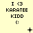 Pixel art icon with 'I <3 KARATEE KIDD' text and smiley face, featuring animated elements like plus signs and dots on a light yellow background.
