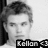 Black-and-white pixelated portrait of a person with short hair, text overlay reading 'Kellan <3' in lower-left corner.