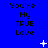 Blue background with repeated text "You're My TRUE Love" in black pixelated font, scattered white star-like shapes, and small white dots.