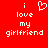 Red background with white pixelated text reading 'i love my girlfriend' and a heart symbol replacing the word 'love'.