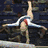 Four distinct gymnastics scenes show a female athlete in red and white attire performing on balance beam, vault, medal ceremony, and floor exercise with audience background.
