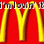 Red background with yellow vertical bars forming a stylized 'M' shape, overlaid text reading "i'm lovin' it" in white and black pixelated font.