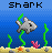 Pixel art scene with a gray shark, green seaweed, pink coral, and orange starfish on sandy ocean floor under blue water.