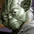 Static pixelated image of a green-skinned humanoid face with closed eyes and subtle facial features, rendered in low resolution with visible dithering and color banding.