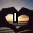 A heart-shaped frame of dark silhouettes overlays a sunset landscape, with text appearing sequentially across three
