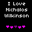 Black background with white pixelated text reading "I Love Nicholas Wilkinson" and five pink/purple heart symbols below, two versions of the same design side-by-side.