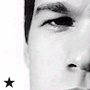 Black-and-white collage of four showing partial facial features and stylized text with star symbols