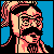 Pixelated static icon of a bearded man with glasses against blue background, rendered in limited color palette with dithering effects.