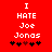 Red background with white pixelated text reading "I HATE Joe Jonas" and five black-and-red asterisks below.