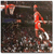 Animated sequence showing a basketball player in red uniform dribbling and shooting, transitioning to a static red silhouette of the same pose on black background.