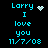 Pixelated cyan text on black background reads 'Larry I love you 11/7/08' with a heart symbol and a dot pattern animation.
