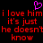 Pixelated red text on black background with a pink heart symbol above, repeating 'i love him it's just he doesn't know' in two mirrored