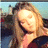 A pixelated image of a person with long light brown hair wearing dark clothing, next to text reading "I am a lighthouse..." on a gradient background.