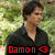 Pixelated image of a person with dark hair wearing a dark collared shirt against a blurred green background with red text overlay.