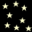 A black background filled with scattered light yellow stars of varying sizes, some appearing blurred or faded.