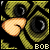 Animated pixel art of a green cartoon character with large black eyes and orange cheeks, displaying a sequence of expressions including a mouth opening to reveal 'BOO!' text.