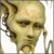 Pixelated close-up of a humanoid face with light skin tone, dark brown hair, and a neutral expression against a white background.
