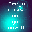 Pixelated text 'Devyn rocks and you now it' on a teal-to-purple gradient background with subtle light effects.