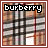 Two side-by-side animated frames of a pixelated Burberry logo icon with plaid background and text, showing subtle color variation between frames.